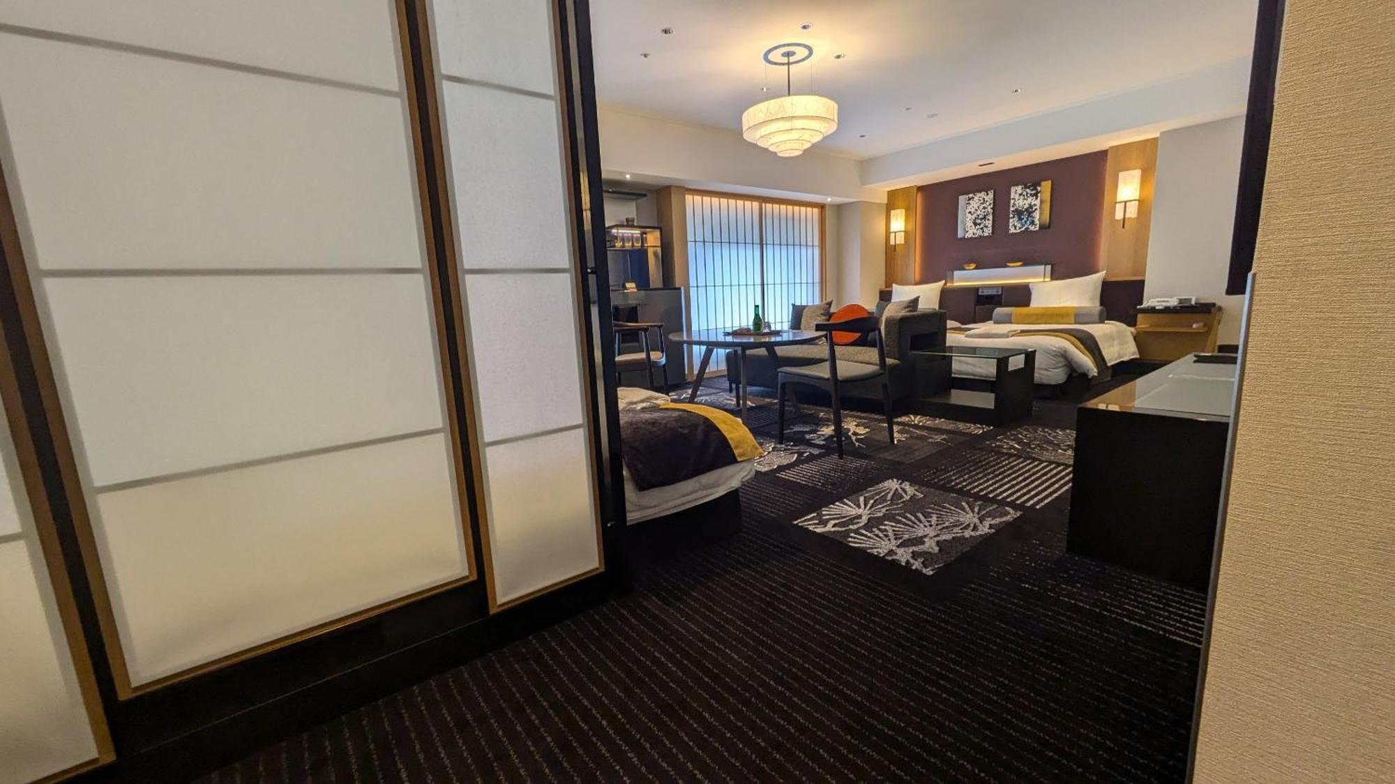 Hotel New Otani Осака Екстер'єр фото A room at the hotel